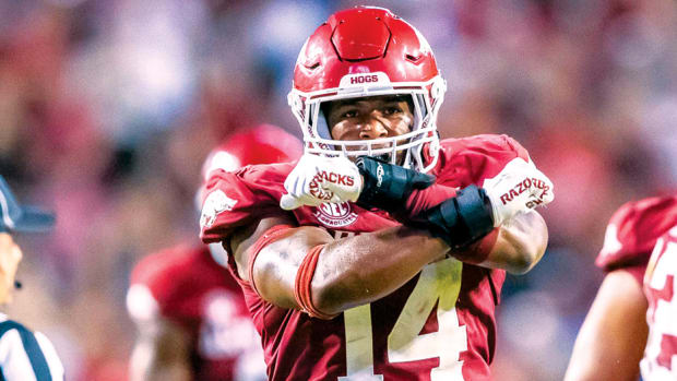 Arkansas defensive lineman Jordan Domineck celebrates a huge stop against Missouri State.